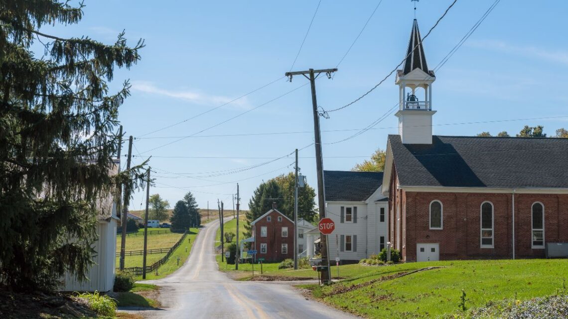 A church next to a small rural road