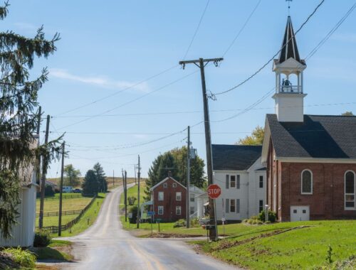 A church next to a small rural road