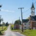 A church next to a small rural road